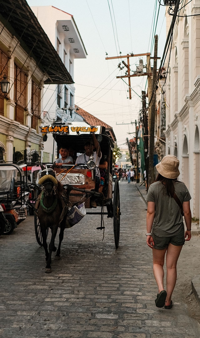 A carriage passing Maggin in the Philippines