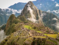 Inca Trail Finish - a daytime picture of green stone mountains of Peru