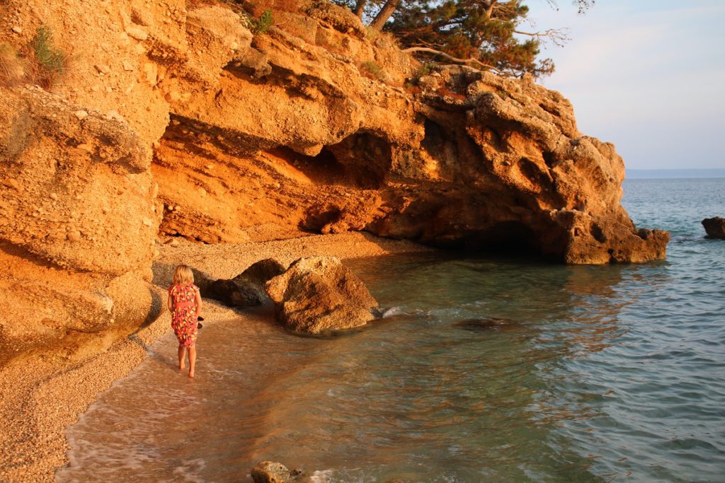 Rocky shore with a cave in Brela, Croatia. 