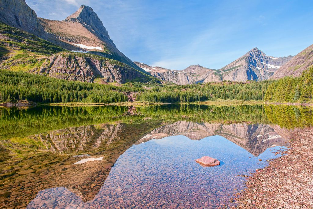 View of Mount Grinnell across Redrock Lake