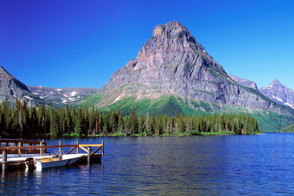 Two Medicine Lake and a boat in the left corner