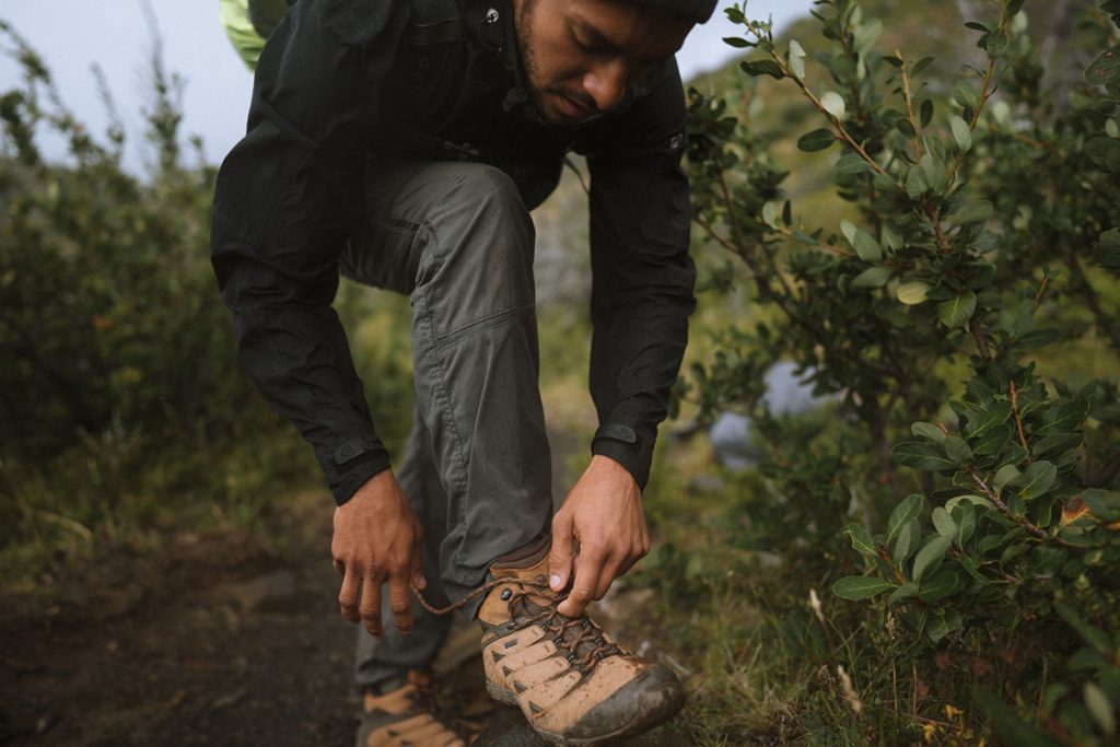 Hiker Tying Shoelaces