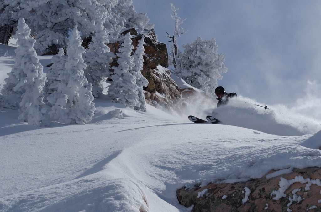 man skiing on snowy grounds