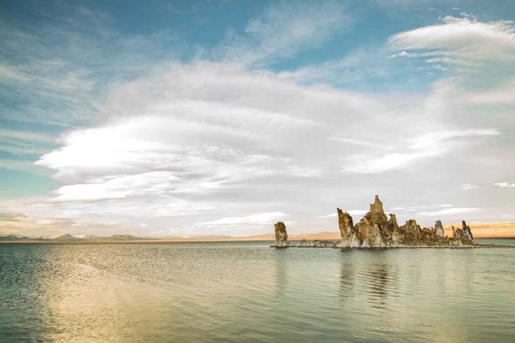 rocky formations on body of water