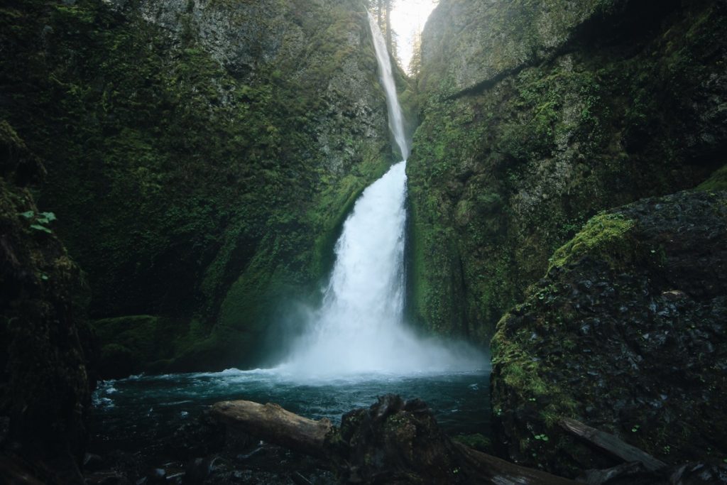 white water falling between the dark rocks