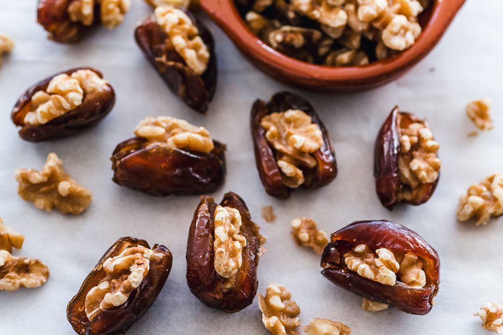 walnuts in dates on table