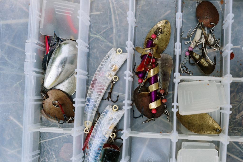 fishing lures in transparent box