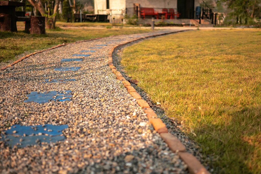 Grawel walkway leading to the garden