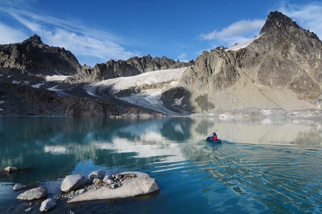 A Man Paddles on Moonstone Lake